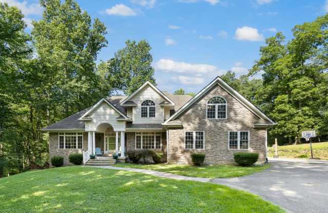 STUNNING HOME ON ACREAGE
