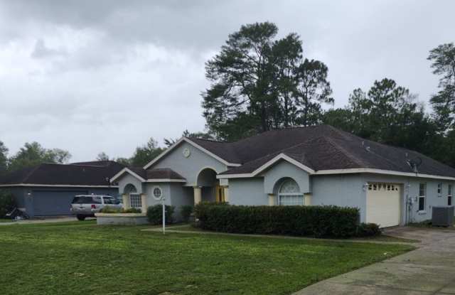 Photo of Oak Crest – 4BR/3BA Home with Covered Patio  Prime Ocala Location