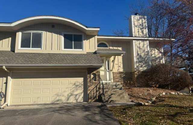 Photo of Beautifully Updated 3 Bed, 2 Bath, 2 Car Garage End Unit Townhome with Vaulted Ceilings