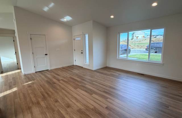BRAND NEW construction! 3 beds, 2 baths, double garage, deck with VIEWS and more!
