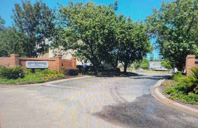 2 Bedroom 2 bath apt with a POOL! Very close to everything but tucked away.