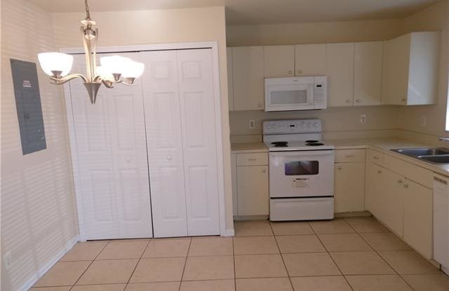 128 Harold AVE S - 128 Harold Ave S, Lehigh Acres, FL 33973