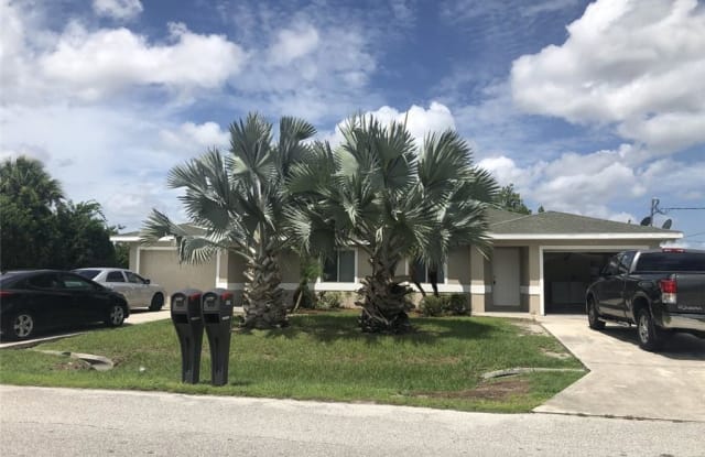 1504 Gilbert AVE S - 1504 1504/1506 Gilbert Ave S, Lehigh Acres, FL 33973