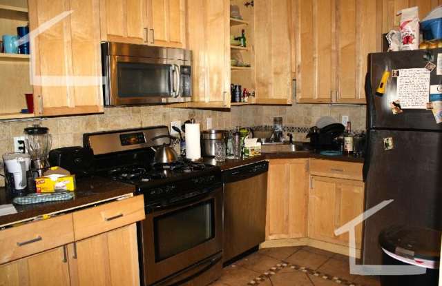 Nicely renovated 4 bed unit near BU and the Green Line.