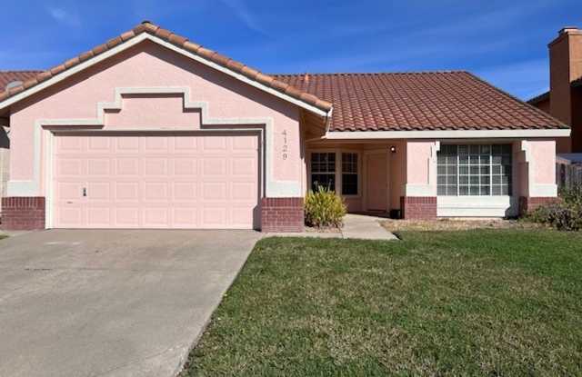 Freshly painted single level 4 bedroom.