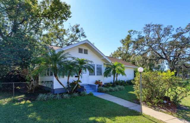 Run don't walk for this one of a kind beautifully maintained Old Florida Charmer on a park like double lot!