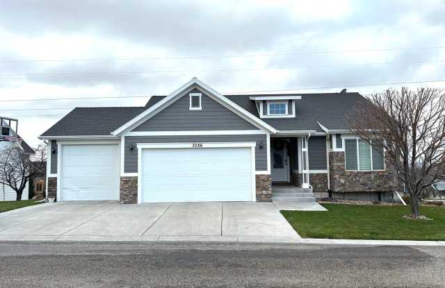 Photo of LOCATION, LOCATION, LOCATION - 4 Bedroom 3 Bath Home with TONS of storage. THIS PRICE INCLUDES THE CITY UTIITIES.