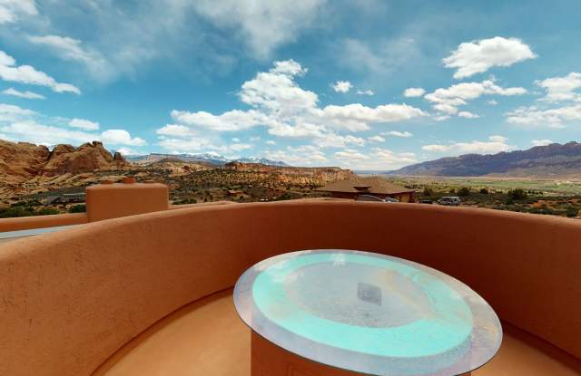 Custom Adobe style home in exclusive Navajo Ridge