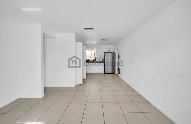 1724 E River Cove St