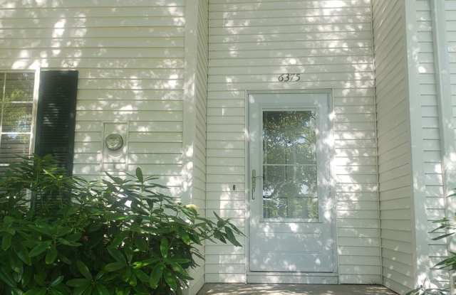 Spacious Townhouse with Two Car Garage!