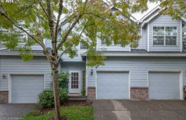 Spacious 3-Bedroom Townhouse with Open Living Areas and Private Patio