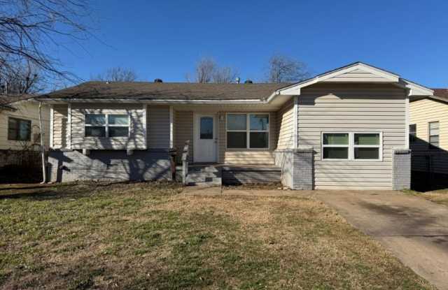 all Brand New 4 bed 1 bath converted garage, deck in back , large backyard in MWC!