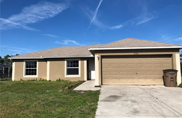 448 Windermere DR - 448 Windermere Drive, Lehigh Acres, FL 33972