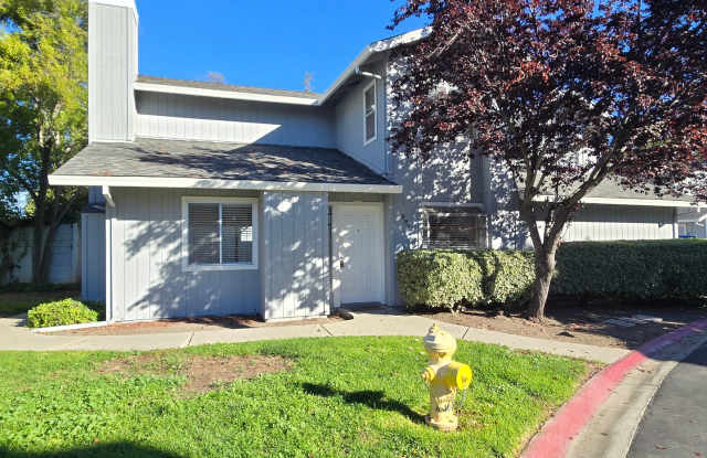 Photo of Spacious 2-Story Townhome, Updated Kitchen, New Appliances, Fresh Paint, Laminate Flooring, New Carpet, Patio, Pool!