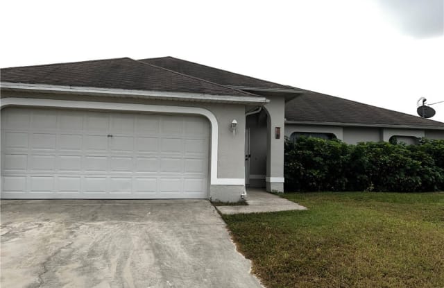 558 Lone Star Lane - 558 Lone Star Lane, Lehigh Acres, FL 33974