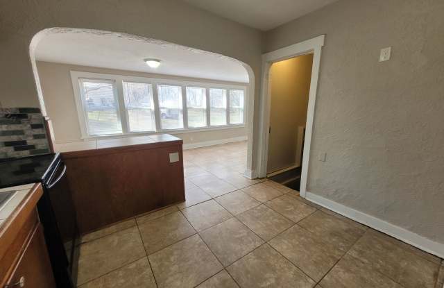 Four bedroom home on Indianola Ave with large yard and two decks!