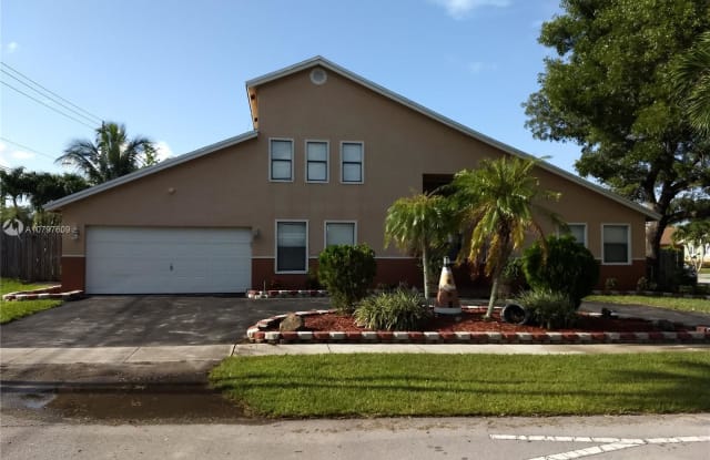 9947 NW 46th Ct - 9947 Northwest 46th Court, Sunrise, FL 33351