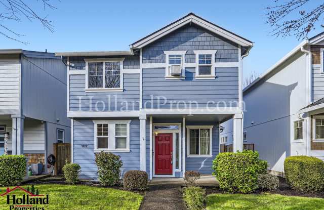 **NEW PRICE** - Elegant Two-Level Home in Hillsboro with Modern Comforts.
