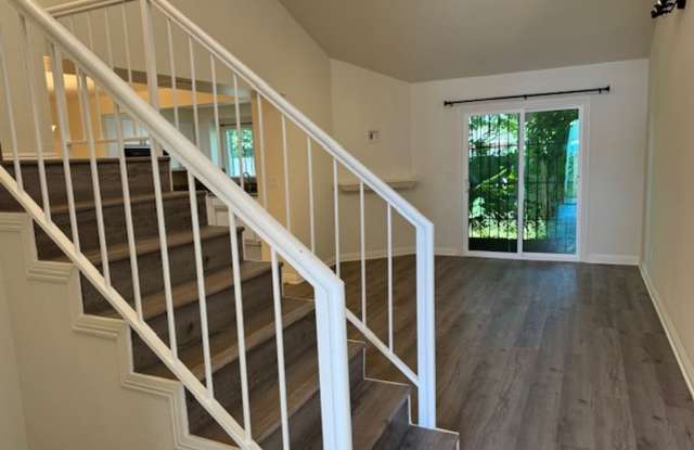 Photo of 3 bedroom 2.5 bath Townhome Beauty . . . 2 car garage, with A/C in gated community