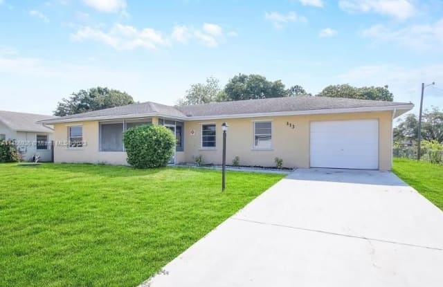 313 NW Dorchester St - 313 Northwest Dorchester Street, Port St. Lucie, FL 34983