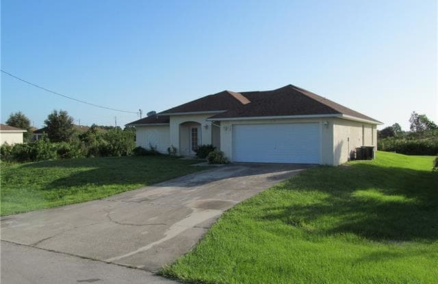 347 Parish AVE - 347 Parish Avenue, Lehigh Acres, FL 33974