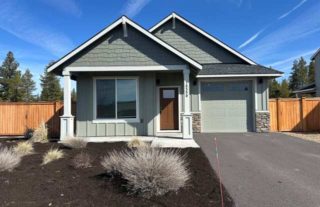 Beautiful Newer Model Home with Open Floor Plan, A/C  Fenced Yard!