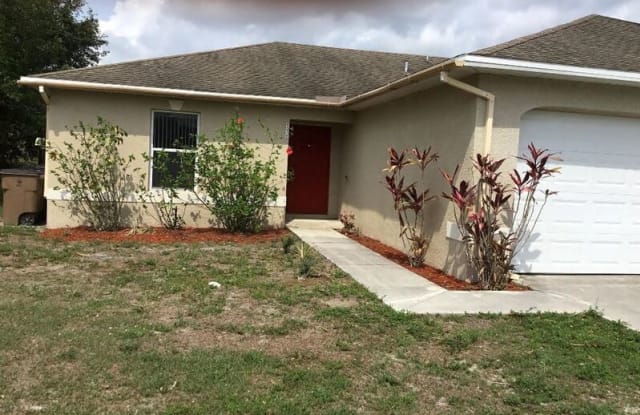 338 Harold Ave S, - 338 Harold Ave S, Lehigh Acres, FL 33973