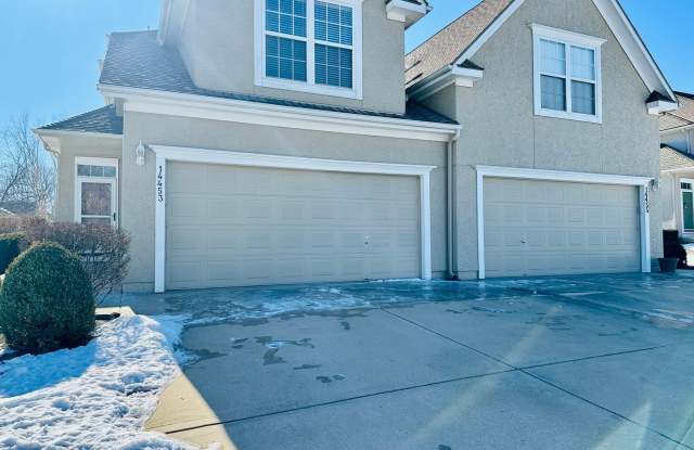{14453} Updated Duplex in Prime Location + Two Car Garage + Wood Floors + Updates throughout
