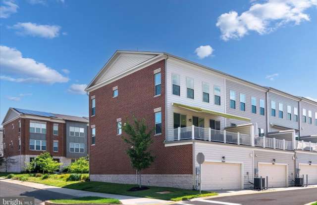 spacious 3-bedroom, 2 full and 2 half bathroom residence