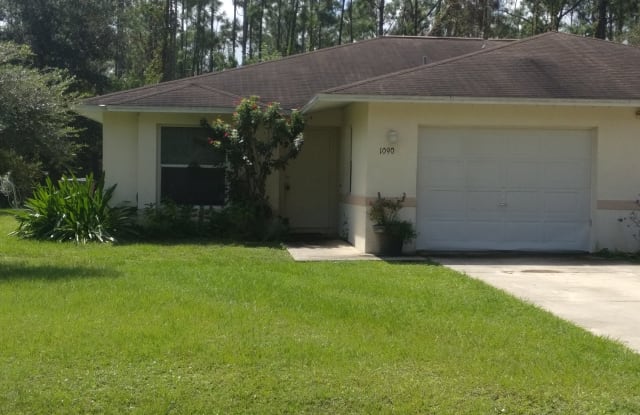 1090 Jaguar Blvd - 1090 Jaguar Boulevard, Lehigh Acres, FL 33974