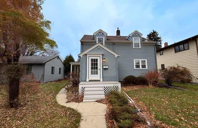 Photo of Charming 3×2 Home with Wrap-Around Porch  Detached Double Garage – $1,795/Month