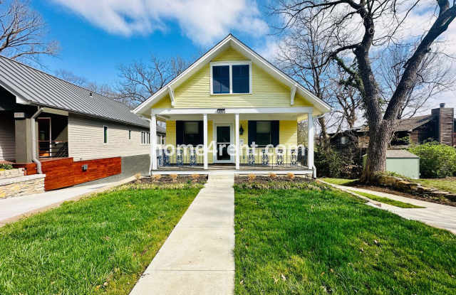 Charming Home Near Country Club Plaza w/ Gorgeous Updates, Wood Floors and a Two Car Garage!