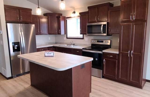 Modern 3 Bedroom Home with Garage & Fenced Yard for Rent!