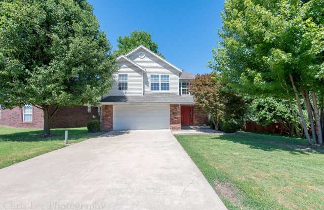 Well maintained 3BR home centrally located in NWA! Wonderful covered back patio/deck! Fenced Yard!