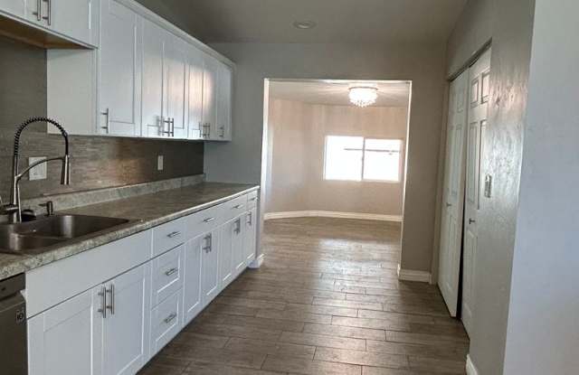 Photo of Beautiful and Spacious 4 bedroom 2 bath on a Corner Lot!