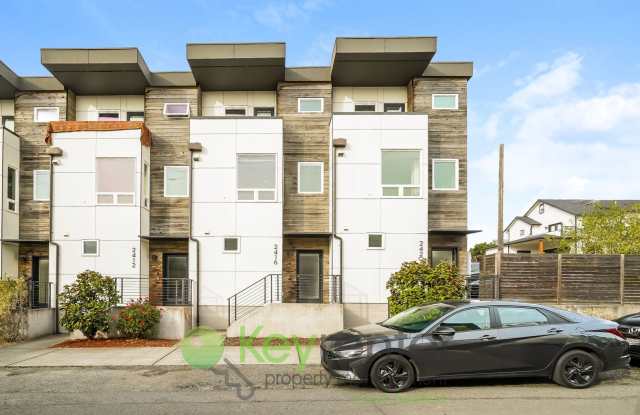 **Rent Special** Modern Two Bedroom Townhome with Designated Parking
