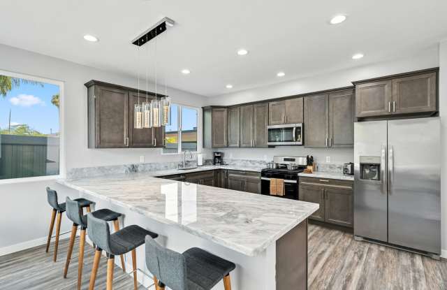 Coastal 3-Bedroom 2-Bathroom House with Huge Private Yard and Private Parking Walking Distance To The Beach