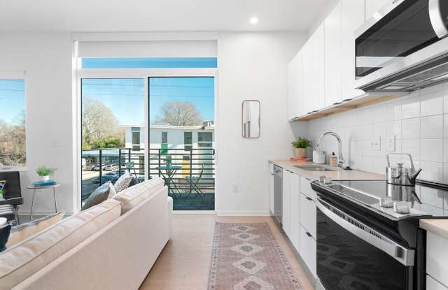Modern downtown condo studio with private balcony & parking space.