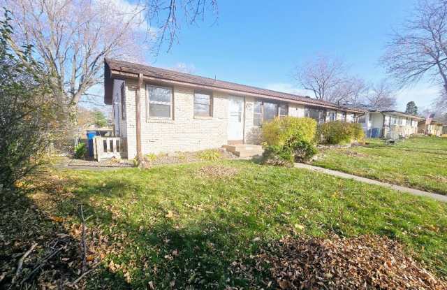 Spacious 3-Bedroom Side-by-Side Duplex with Family Room  Off-Street Parking