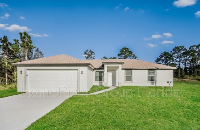 761 Puccini Ave S - 761 Puccini Avenue South, Lehigh Acres, FL 33974