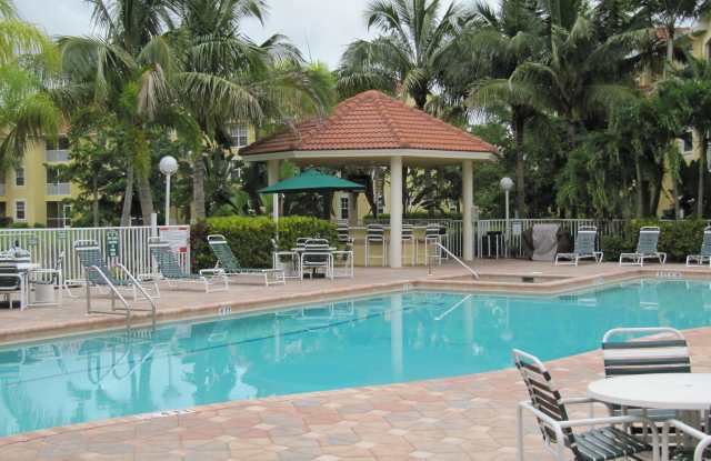 ***ST. CROIX AT PELICAN MARSH ** 2/2 CONDO - GREAT LOCATION CLOSE TO VANDY BEACH***ONE CAR GARAGE***GATED***