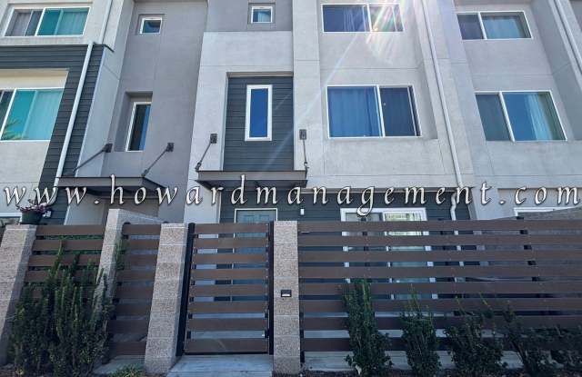 3 Bed 3 Bath, Three Story Townhome with private garage, Large Living Space, Private Patio with Washer/dryer in unit