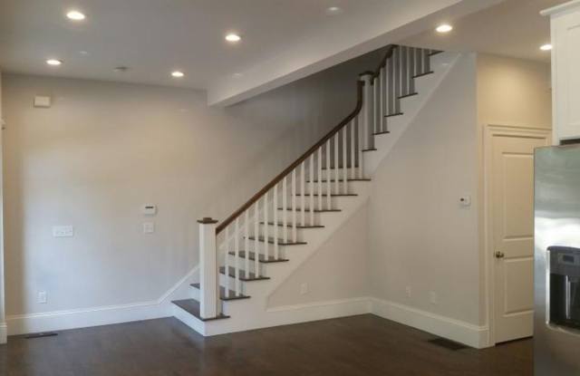 Remodeled Firehouse Home! 4 bed / 4 bath Luxury Appliances, W/D in Unit!