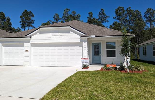 PREMIUM FINISHES AND A PREMIUM DEAL FOR AN 18 MONTH LEASE!! NEW 4/2/3 CONSTRUCTION - LARGE 4 Bedroom, 2 Bath home located in Entrada Gated Section - 106 Zancara Street, St. Johns County, FL 32084