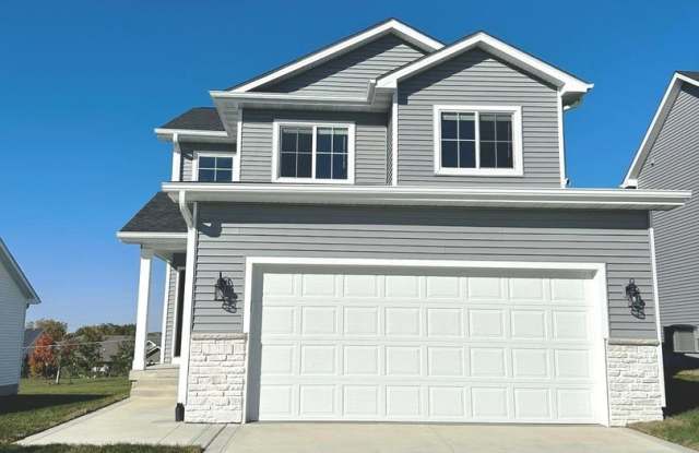 "Charming Family Living: 3BR, 2BA Home Steps Away from High School, Triumph Park, and Sugar Creek Elementary, with Easy Highway Access and a 3-Car Garage!" - 705 Southeast Mesa Drive, Waukee, IA 50263