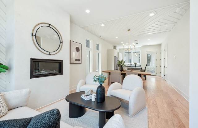 This stunning new townhome is available for immediate move-in. photos photos