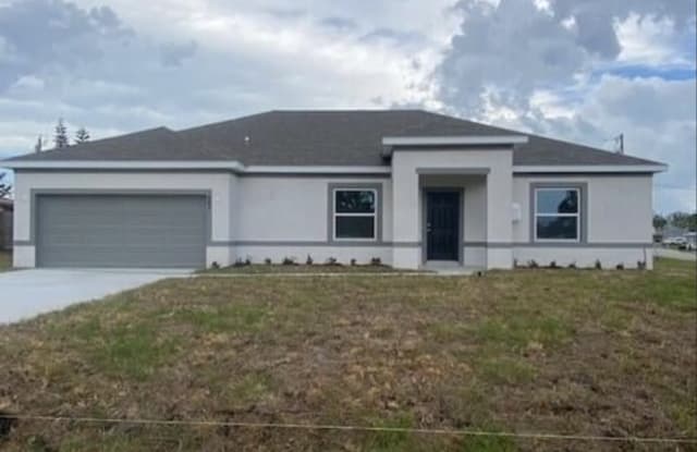 483 Se Sunnydale Ln - 483 Southeast Sunnydale Lane, Port St. Lucie, FL 34983