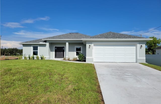 509 NW 16th Place - 509 Northwest 16th Place, Cape Coral, FL 33993