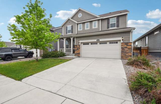 Charming 4BR House in Parker with 900 sq feet Finished Basement