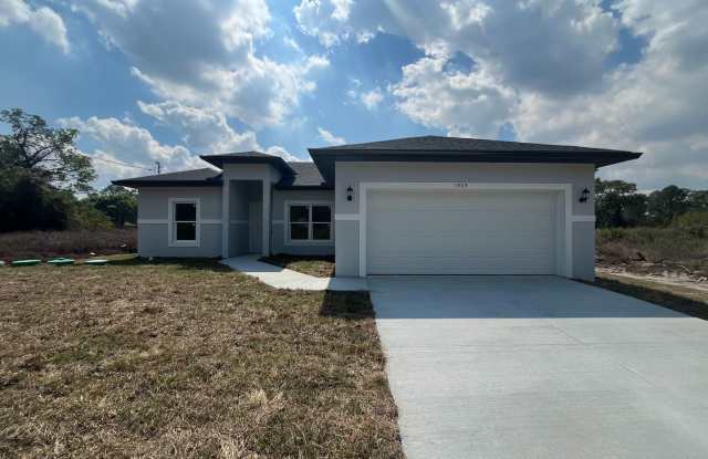 MODERN BRAND NEW 4BD/2BA RETREAT IN LEHIGH ACRES!